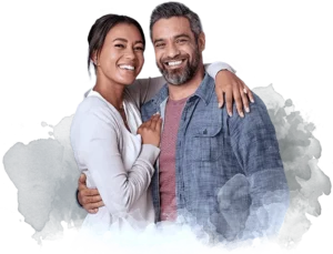 Attractive couple in their 30s smiling and embracing after Botox and wrinkle relaxer treatments to smooth fine lines and reduce wrinkles at Infinite You MedAesthetics.