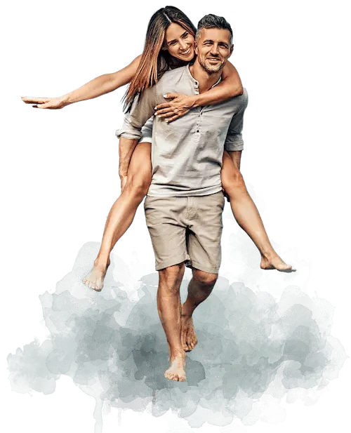 Attractive couple in their 40s wearing summer clothes, laughing and enjoying a piggyback ride, representing confidence and vitality after treatments like Botox, dermal fillers, Morpheus8 microneedling, laser skin resufracing, Keralase hair restoration, and DiolazeXL laser hair removal for women and men at Infinite You MedAesthetics.